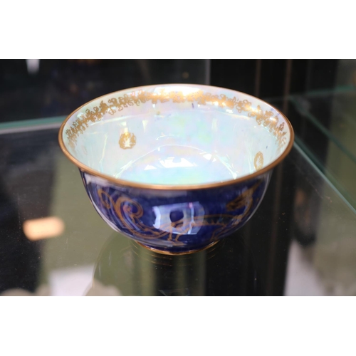 34 - Wedgwood dragon lustre bowl internally painted with three fruit and externally with twin dragons, pr... 