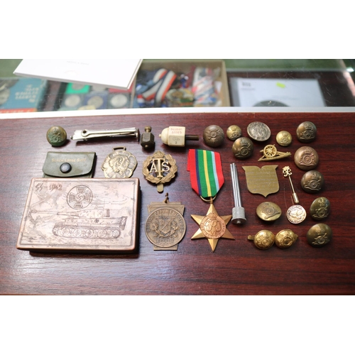 398 - WW2 German Tank decorated tin and assorted Badges and WW2 Medal