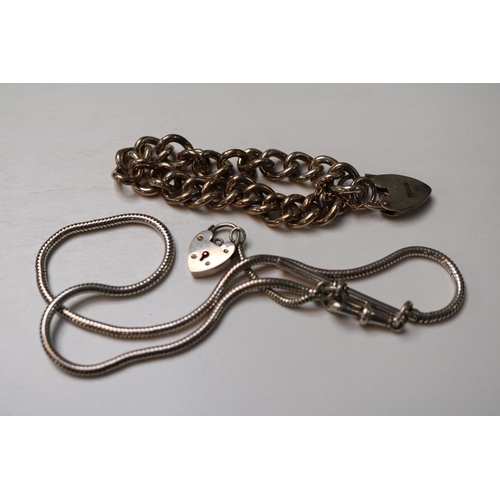 399 - Silver Curb Chain Bracelet with padlock and a Silver Serpentine necklace 60g total weight