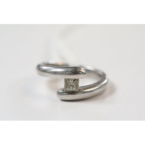 Ladies Platinum Diamond Princess Cut ring of cross over design Size L. 10g total weight Estimated 0.30ct