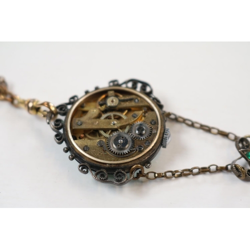 430 - Ladies Silver enamelled numeral watch with gilt chain