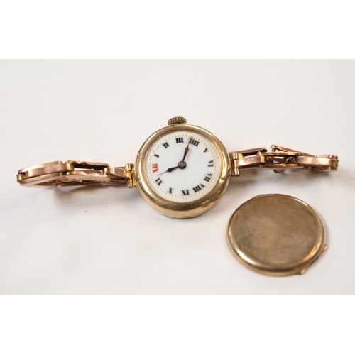 431 - Ladies 9ct Gold watch with Swiss movement and expanding gilt bracelet