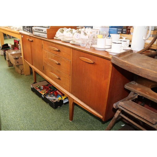 471 - Mid Century Teak Low Sideboard of 3 Cupboards and 3 drawers supported on tapering legs