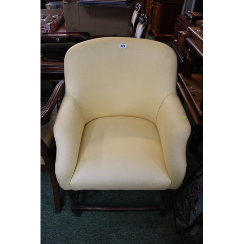 479 - Upholstered Cream Elbow chair on Turned wooden supports and straight stretchers