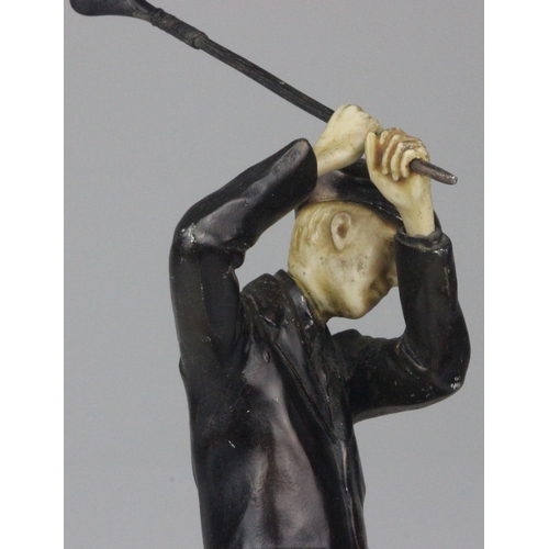 28 - 1930s trophy Cast Metal figure of a Golfer in full swing with patinated finish 28.5cm in Height