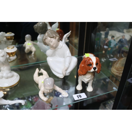 19 - Beswick King Charles Spaniel, Copenhagen figure of a Baby and a Lladro Angel