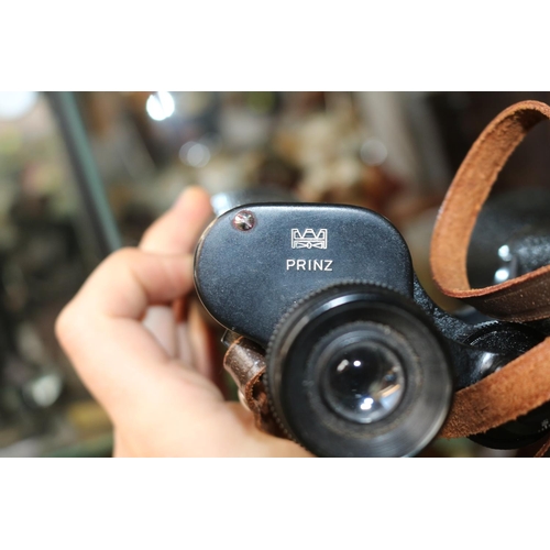 22 - Pair of Prinz 12 x 50 Binoculars in Leather case