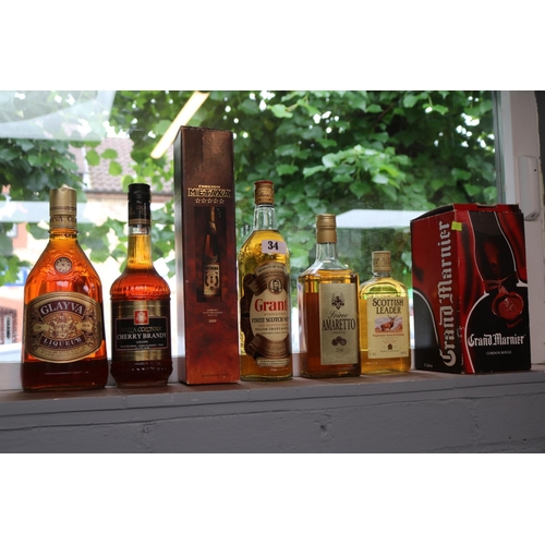 34 - Collection of Assorted Alcohol to include Grants Whisky, Glayva, Metaxa etc