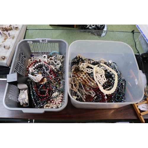 487 - 2 Boxes of assorted Costume jewellery to include Necklaces, Bangles, watches etc