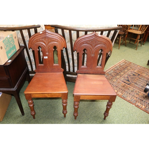 515 - Pair of Edwardian Mahogany hall chairs with carved pierced back