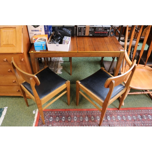 547 - Mid Century table and a set of 4 chairs