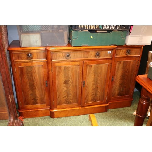 568 - Yew breakfront Sideboard