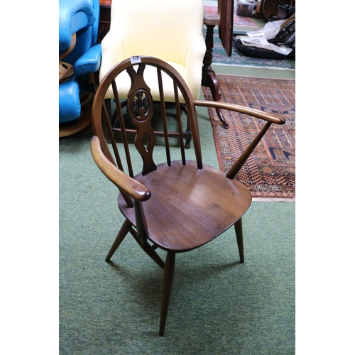 578 - Ercol Low Elbow chair with pierced back