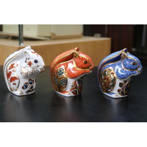 135 - 3 Royal Crown Derby Paperweights to include Debenhams Squirrel with Gold & Silver stoppers