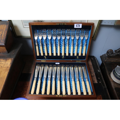 171 - Edwardian Walnut cased canteen of fish knives and forks with engraved detail and bone handles