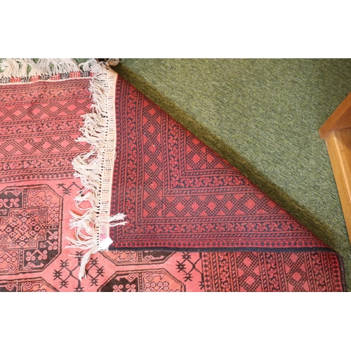 202 - Large Red Ground Indian Rug with tassel ends 320 x 198cm