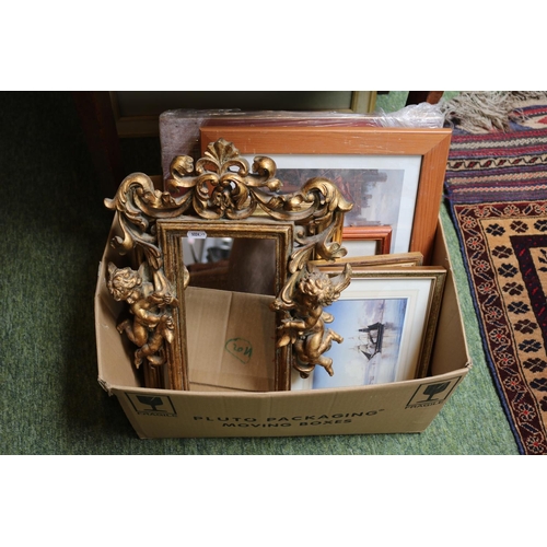 210 - 20thC Gilt Cherub decorated mirror and assorted pictures and prints