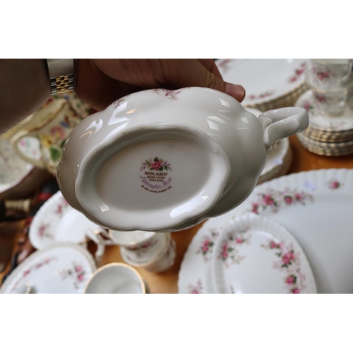 241 - Royal Albert Lavender Rose Dinner service to include Tureen, Dinnerplates, Meat plate etc