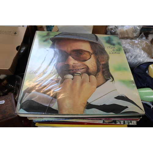 266 - Collection of assorted Vinyl Records to include Elton John, Cream, Rod Stewart etc