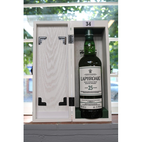 34 - Laphroaig Islay Single Malt Scotch Whisky Aged 25 Years in White wooden presentation box 2019