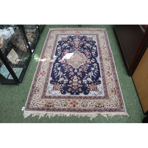 41 - Persian tribal Rug of blue ground 175 x 115cm with tassel ends