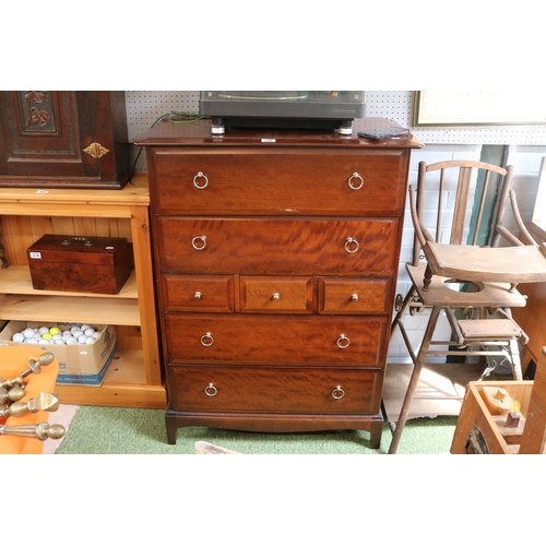 599 - Stag Chest of Seven drawers with brass drop handles