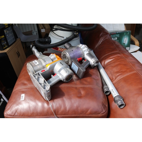 648 - 2 Dyson vacuums