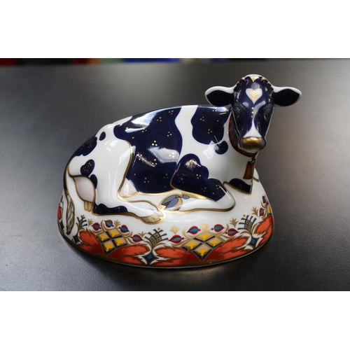 79 - Royal Crown Derby Paperweight Friesian Cow Buttercup MMII with Gold Stopper boxed