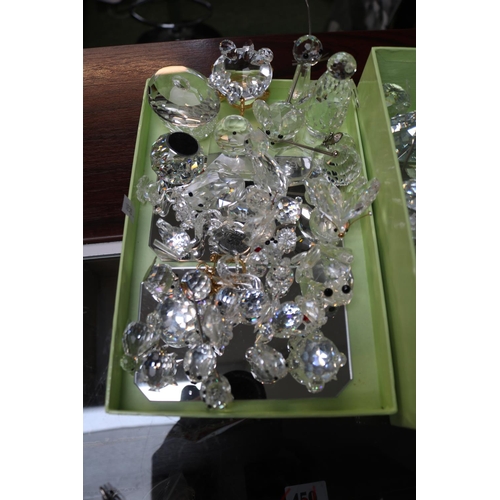 59 - 2 Boxes of assorted Swarovski Crystal figures and ornaments