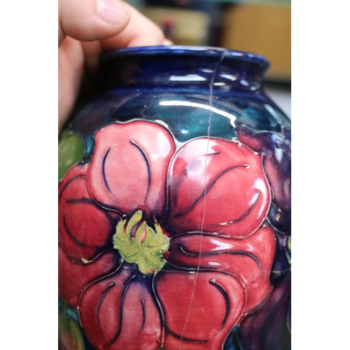 65 - Moorcroft Anemone blue ground vase with impressed and signed base. 25cm in height A/F