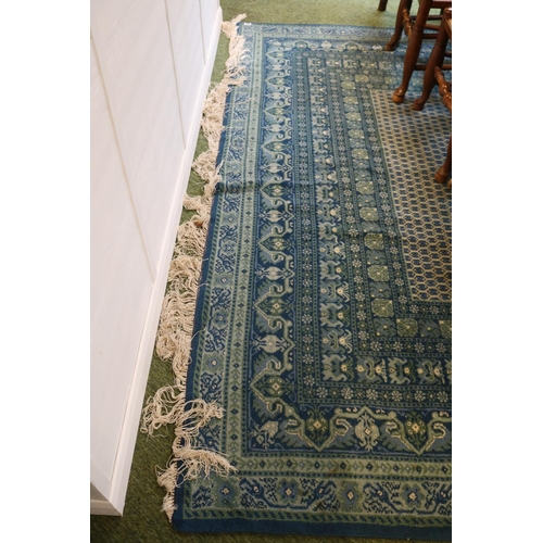 137 - Large Blue Ground Rug with Tassel ends 320cm in Length