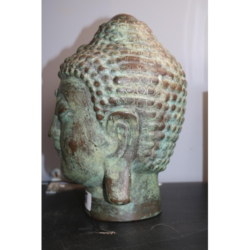 37 - Large Bronze Patinated Buddhist Head. 23cm in Height