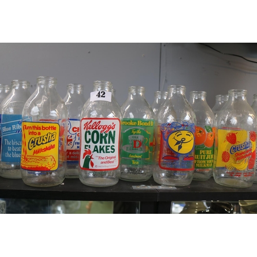 42 - Collection of Advertising Milk Bottles to include Kelloggs, Crusha etc