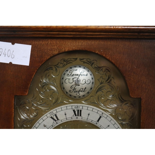 53 - English Made clock with Brass and Silvered Dial in Walnut Case