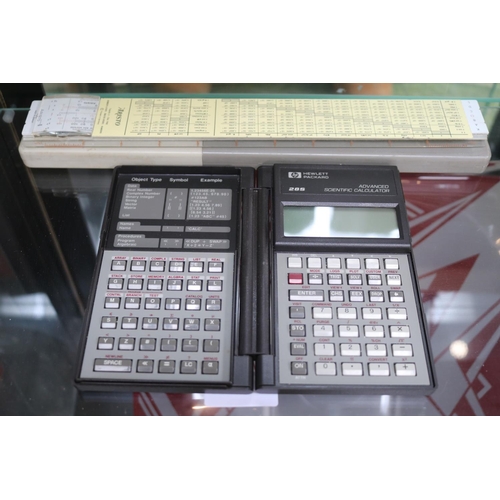 64 - Hewlett Packard 28S Scientific Calculator and a Aristo Slide Rule