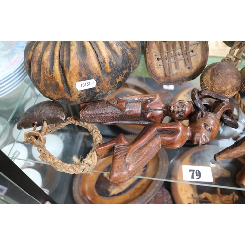 79 - Good collection of assorted Ethnographic items to include Peruvian carved Gourd, African Carvings et... 