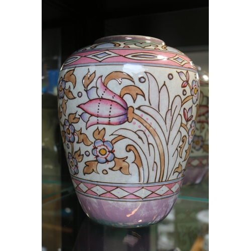 89 - Bursley ware Charlotte Rhead Tube lined and decorated bellflower vase. signed to base 22cm in Height