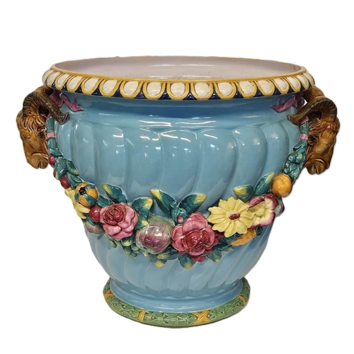 1 - Minton Majolica Jardinière with rams head handles and applied floral garland on turned fluted body. ... 