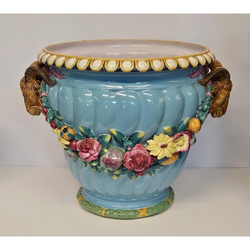 1 - Minton Majolica Jardinière with rams head handles and applied floral garland on turned fluted body. ... 