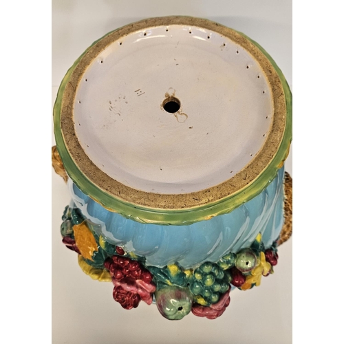 1 - Minton Majolica Jardinière with rams head handles and applied floral garland on turned fluted body. ... 