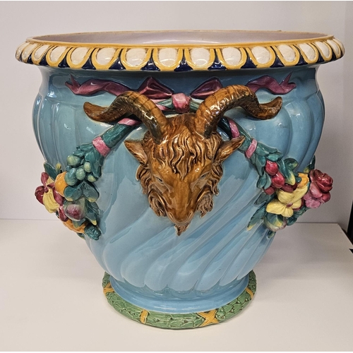 1 - Minton Majolica Jardinière with rams head handles and applied floral garland on turned fluted body. ... 