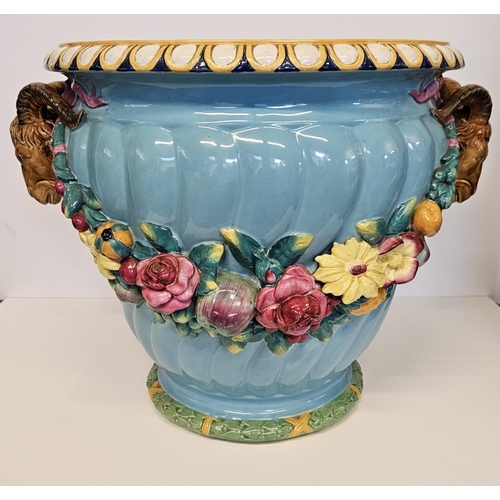 1 - Minton Majolica Jardinière with rams head handles and applied floral garland on turned fluted body. ... 