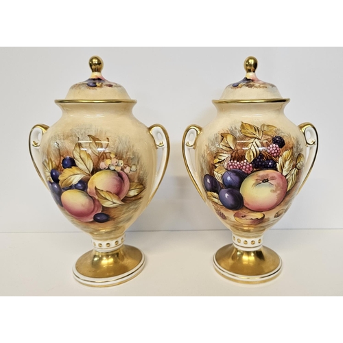 11 - Aynsley Orchard Gold pair of twin handled vases with covers.  Decorated with Fruit and Flowers with ... 