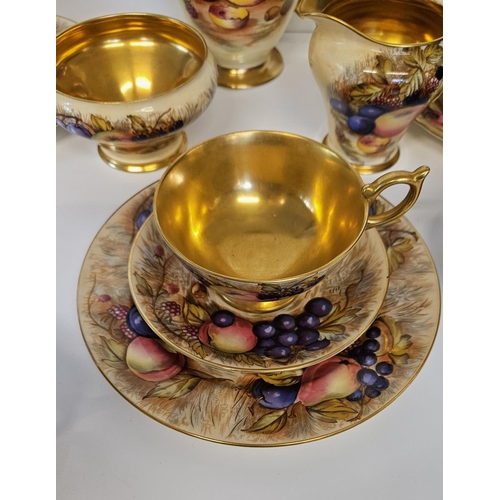 12 - Aynsley China Orchard Gold tea/coffee set, gilded and hand painted with fruit, each piece signed res... 