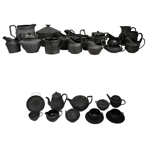 22 - Collection of Wedgwood Black Basalt tableware to include Teapots with covers, Sugar bowls, Cream Jug... 