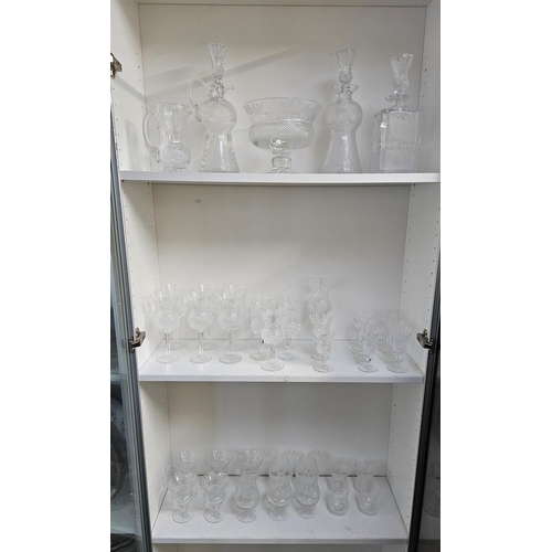 35 - Extensive suite of Edinburgh Thistle pattern Crystal glassware to include Decanters with Thistle kno... 