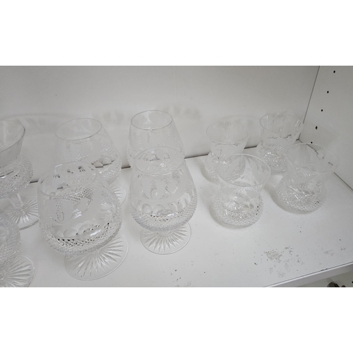 35 - Extensive suite of Edinburgh Thistle pattern Crystal glassware to include Decanters with Thistle kno... 