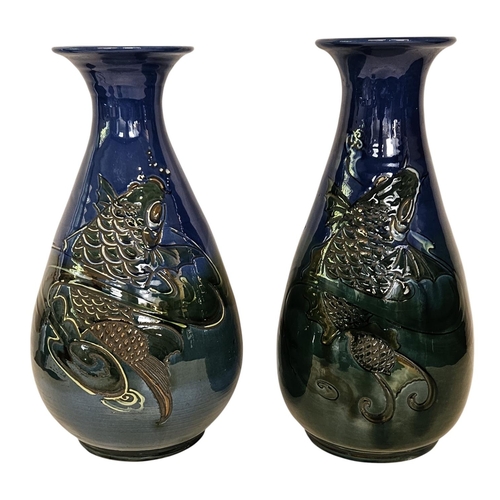 9 - C. H. Brannam pottery matched pair of baluster vases, c.1902, each incised and relief decorated in c... 