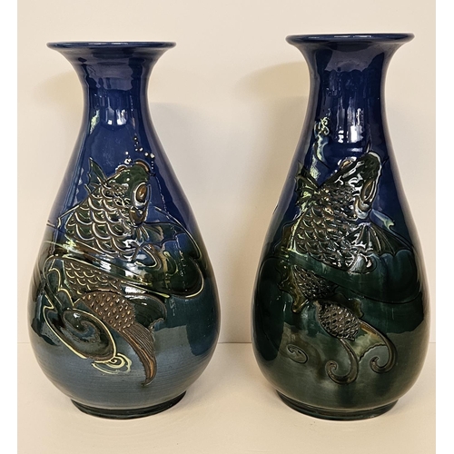 9 - C. H. Brannam pottery matched pair of baluster vases, c.1902, each incised and relief decorated in c... 