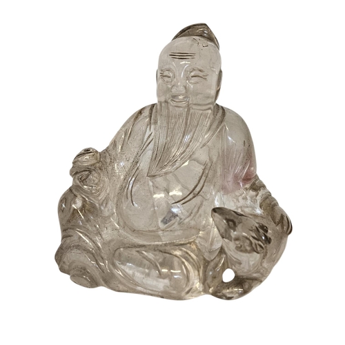 44 - 18thC Chinese carved rock crystal Buddha /Wiseman with seated dog. H 10.5cm W 11cm.